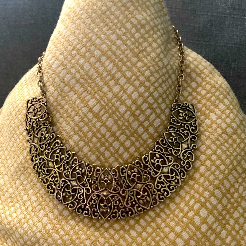 Gold colored collar necklace